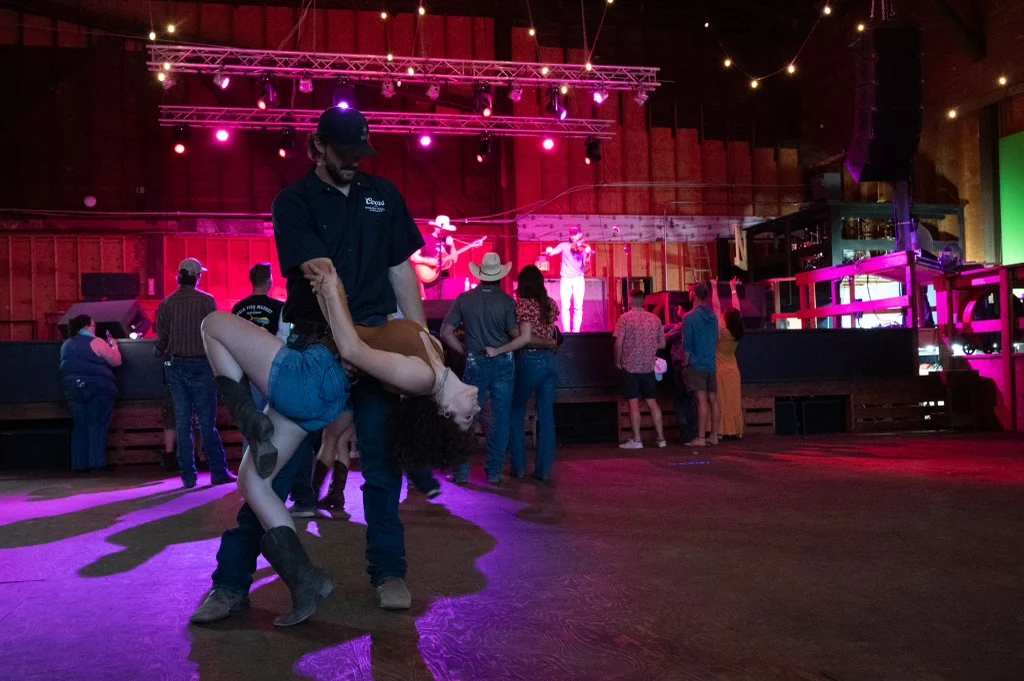 People dancing during a live music event at Roadhouse at the Mill in Emmett, Idaho